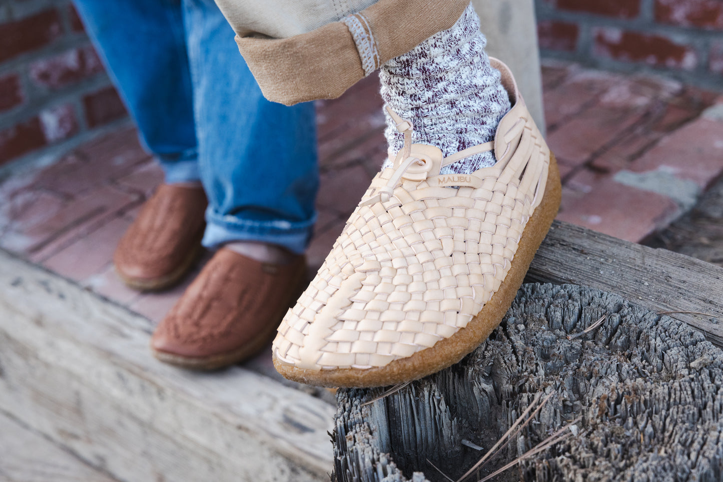 Malibu sandals hand woven Latigo in vegan leather tan and crepe sole home page banner for fall winter