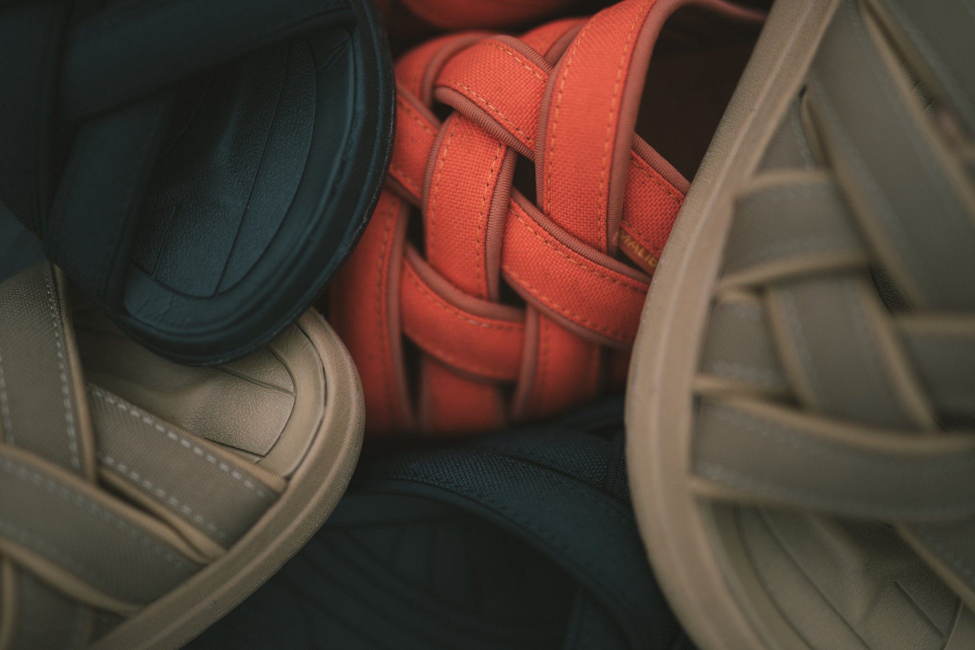 Close up photo of Malibu Sandals Woven Nylon Zuma LX in olive, black and sierra red. 